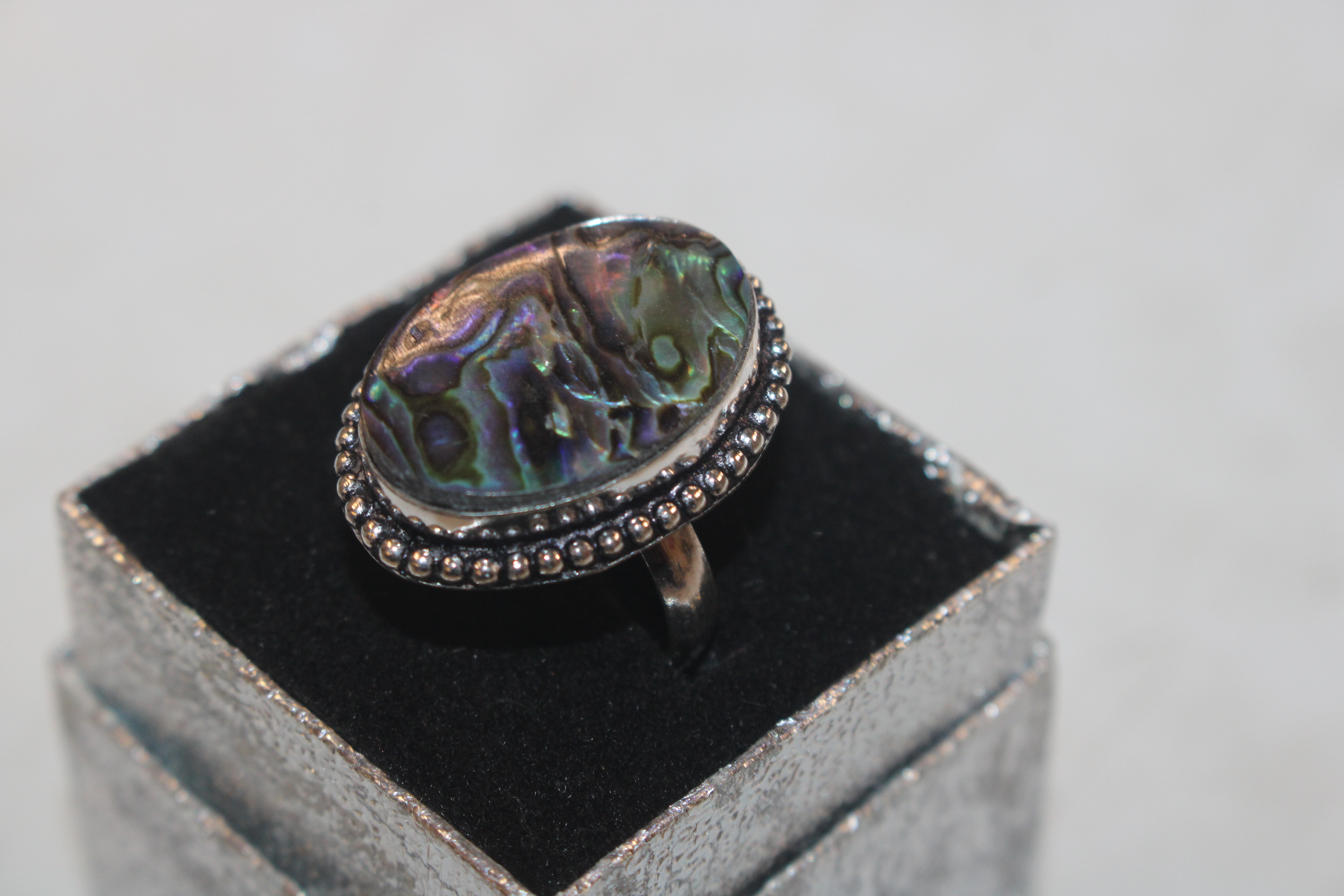 A 925 silver and abalone shell set ring