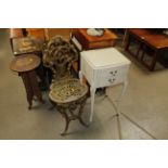 A cream and gilt bedside table fitted two drawers