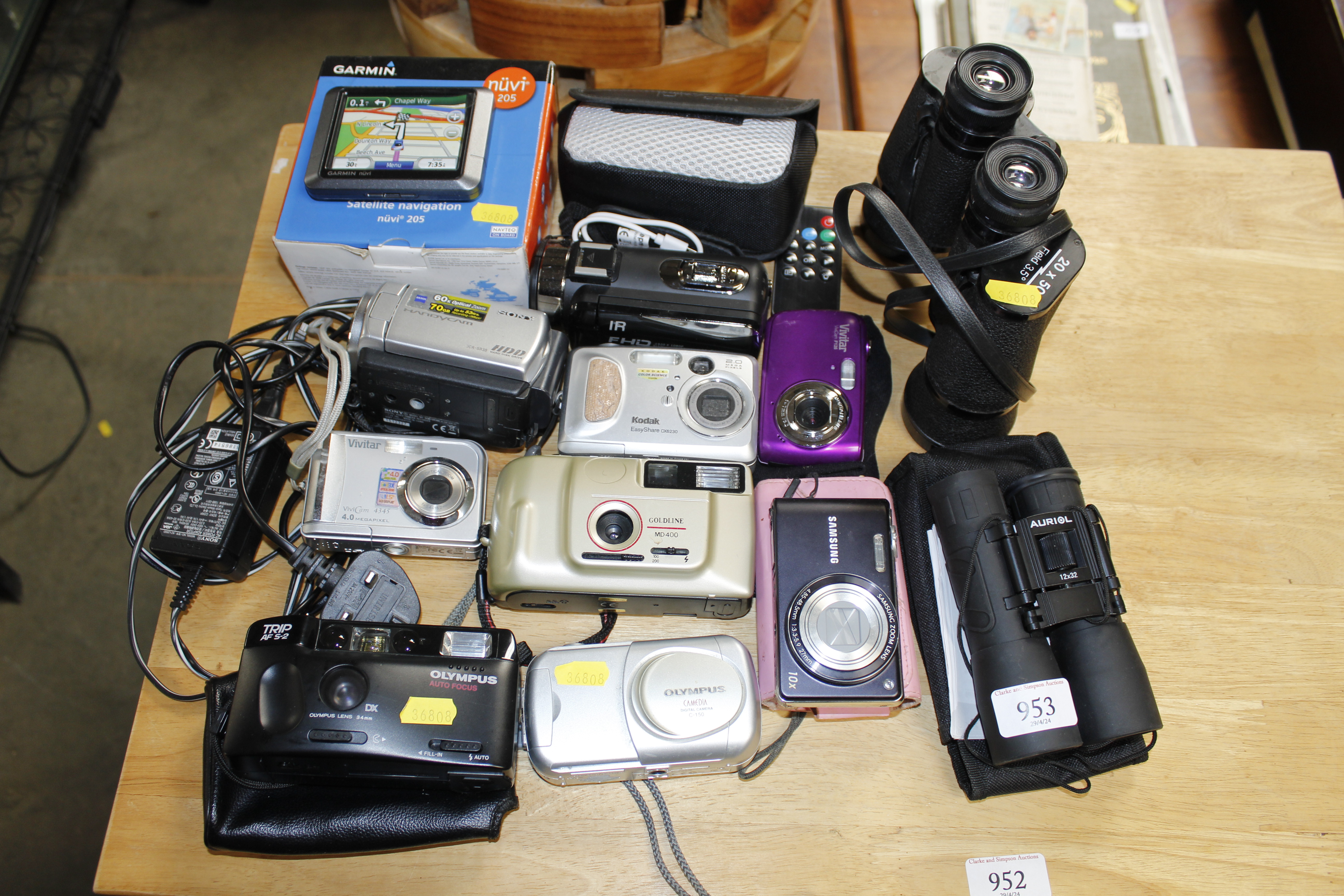 A collection of various cameras to include Kodak,