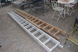 A wooden extending ladder