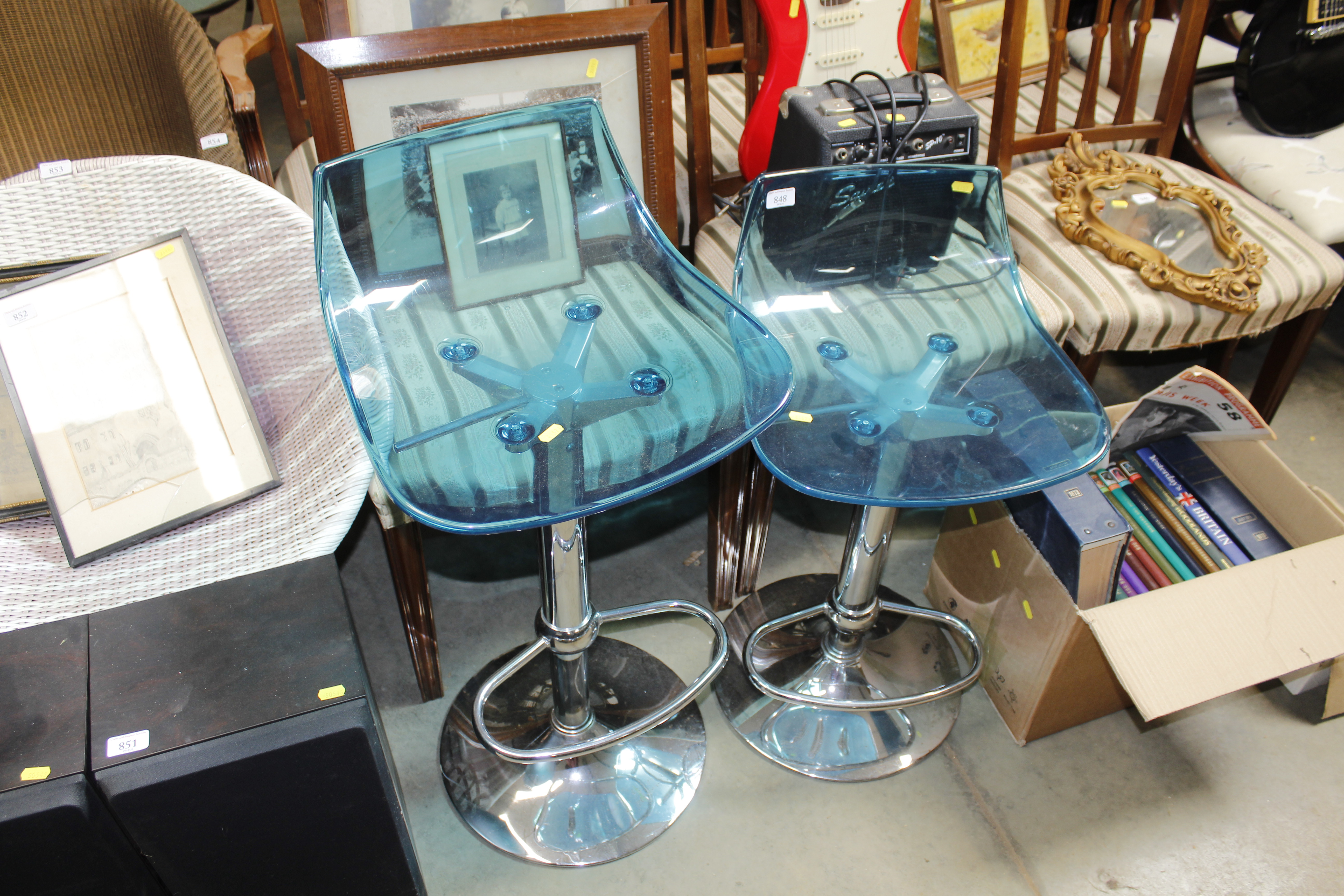 Two adjustable bar stools