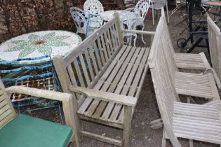 A teak three seater garden bench