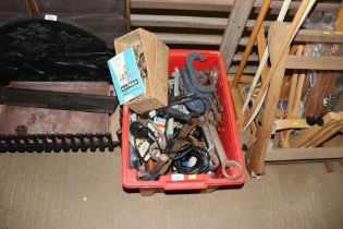 A box containing various tools to include large sp