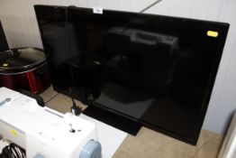 A Digihome flat screen television lacking remote c