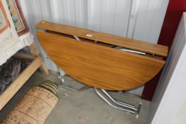 A metal framed folding table