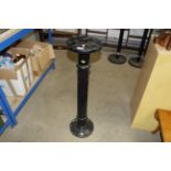 A torchere drawer chair stand
