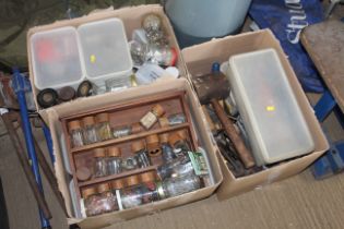 Three boxes containing various fixings, nails, tac