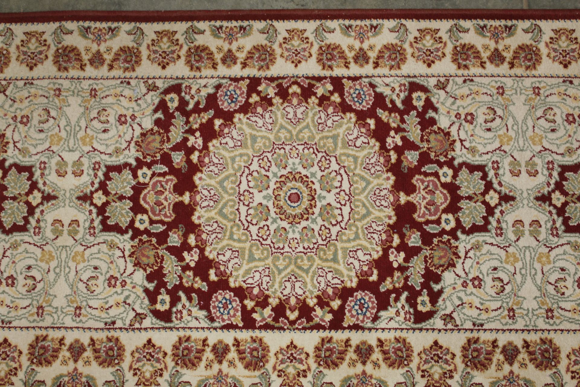 An approx. 8'4" x 2'3" floral patterned rug - Image 2 of 5