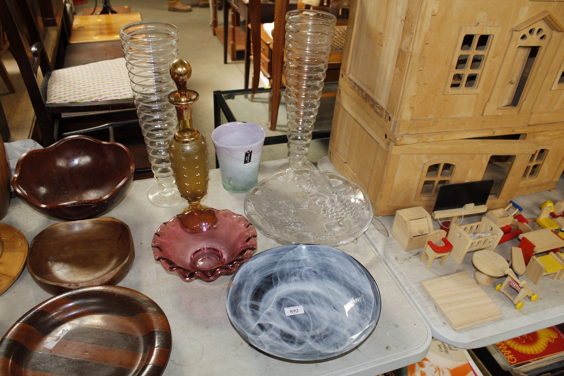 A collection of glassware to include a pair of vas