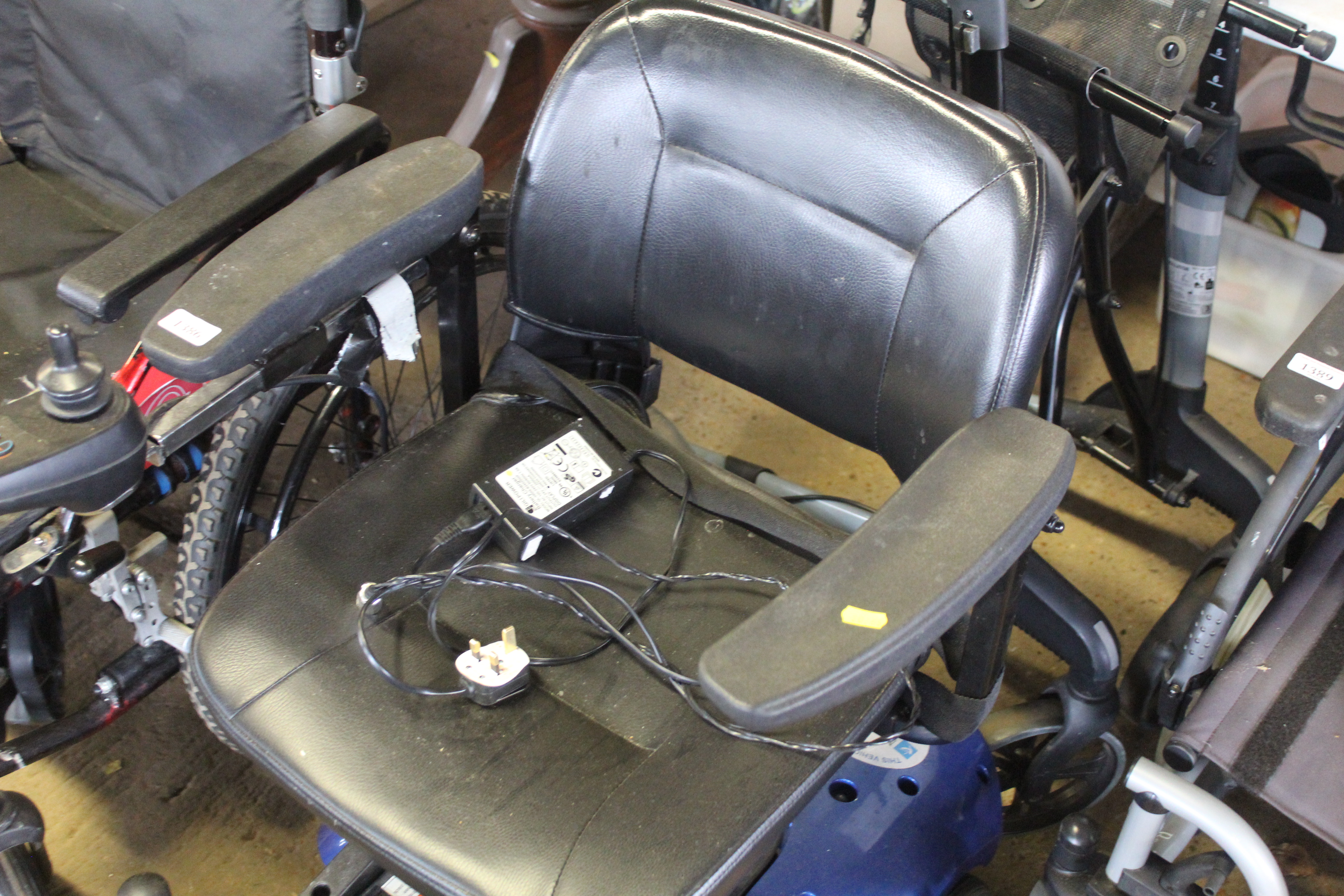 A CareCo electric wheelchair with charger, sold as - Image 2 of 3