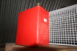 A red painted metal two gallon fuel can with flask