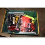 A box containing two sets of jump leads, rope, flu