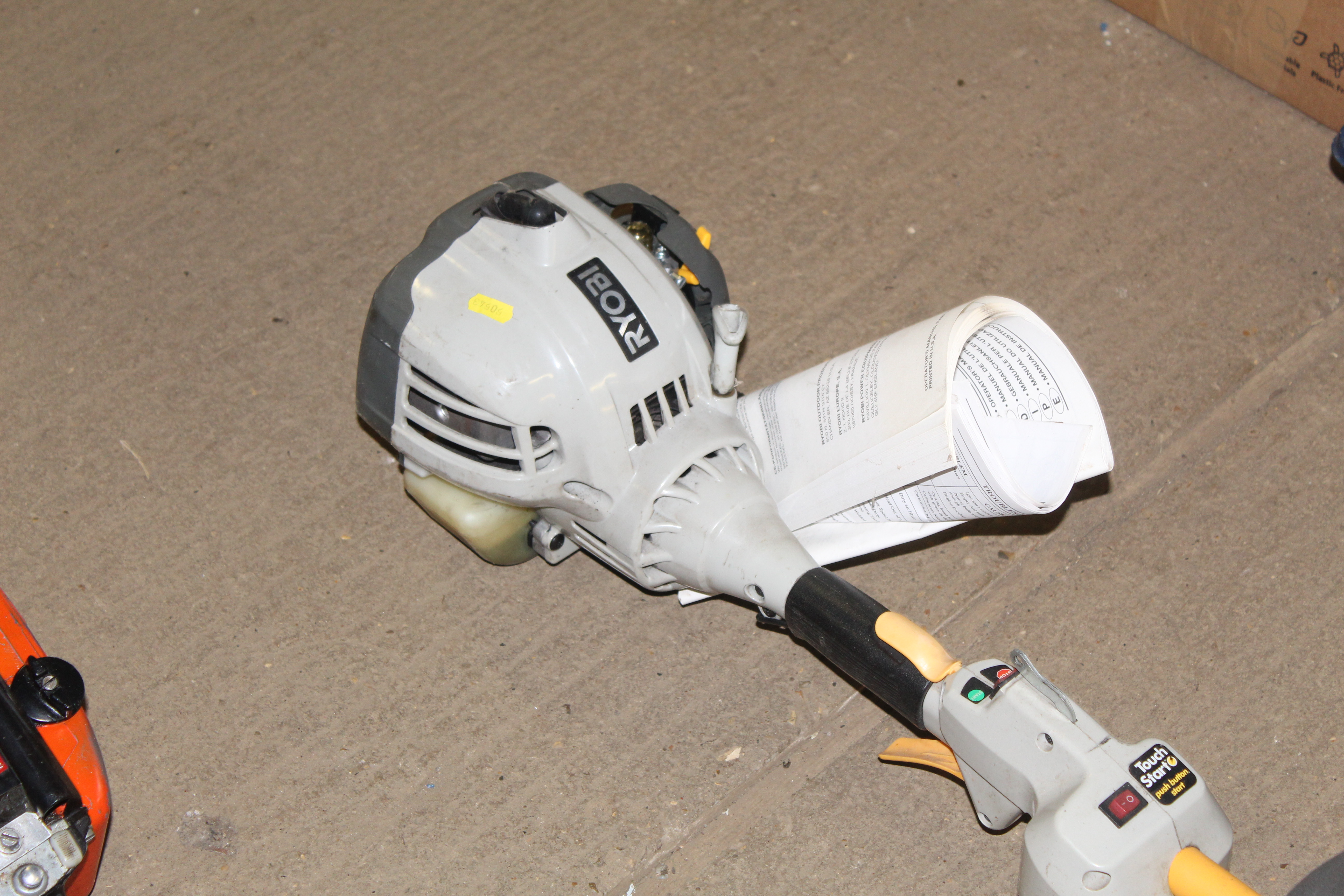 A Ryobi petrol strimmer with instruction guide - Image 2 of 4