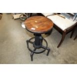 An industrial style adjustable stool