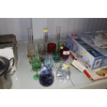 A small collection of coloured glassware including