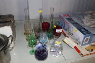A small collection of coloured glassware including