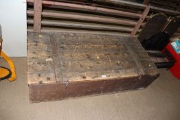 A large pine metal lined storage box