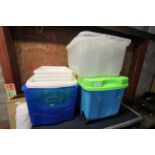 A quantity of plastic storage boxes