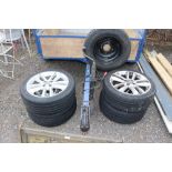 Four Vauxhall alloy wheels and tyres (215/45ZR17)
