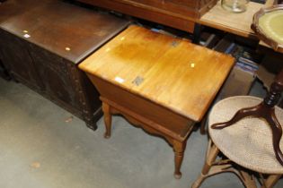 An oak sewing table