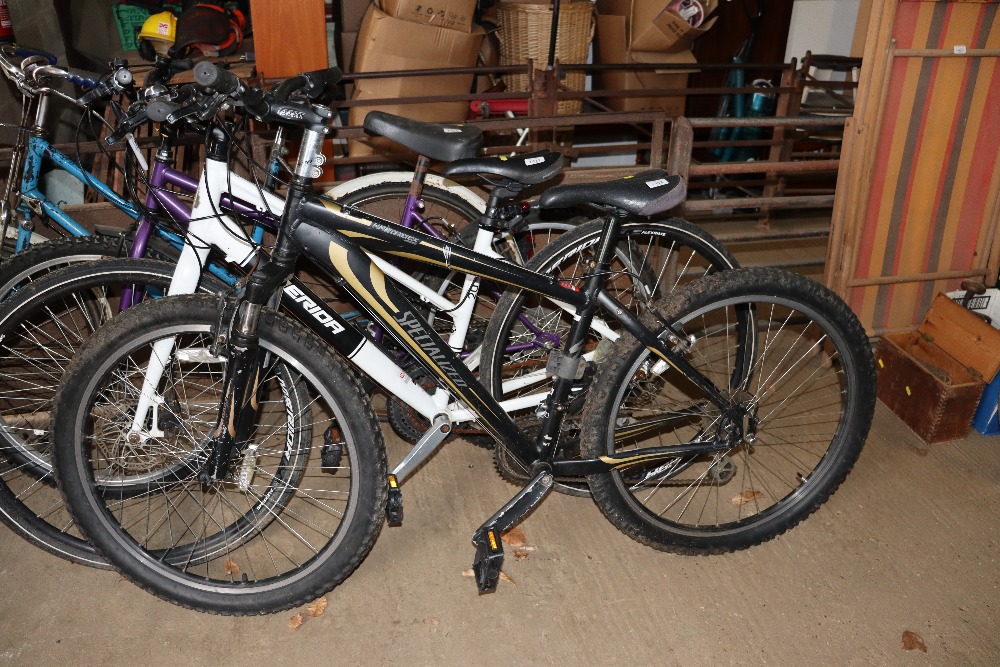 A men's Specialized Hard Rock sport mountain bike with front suspension, 3 x 8 speed gears