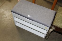 A stool with under seat storage
