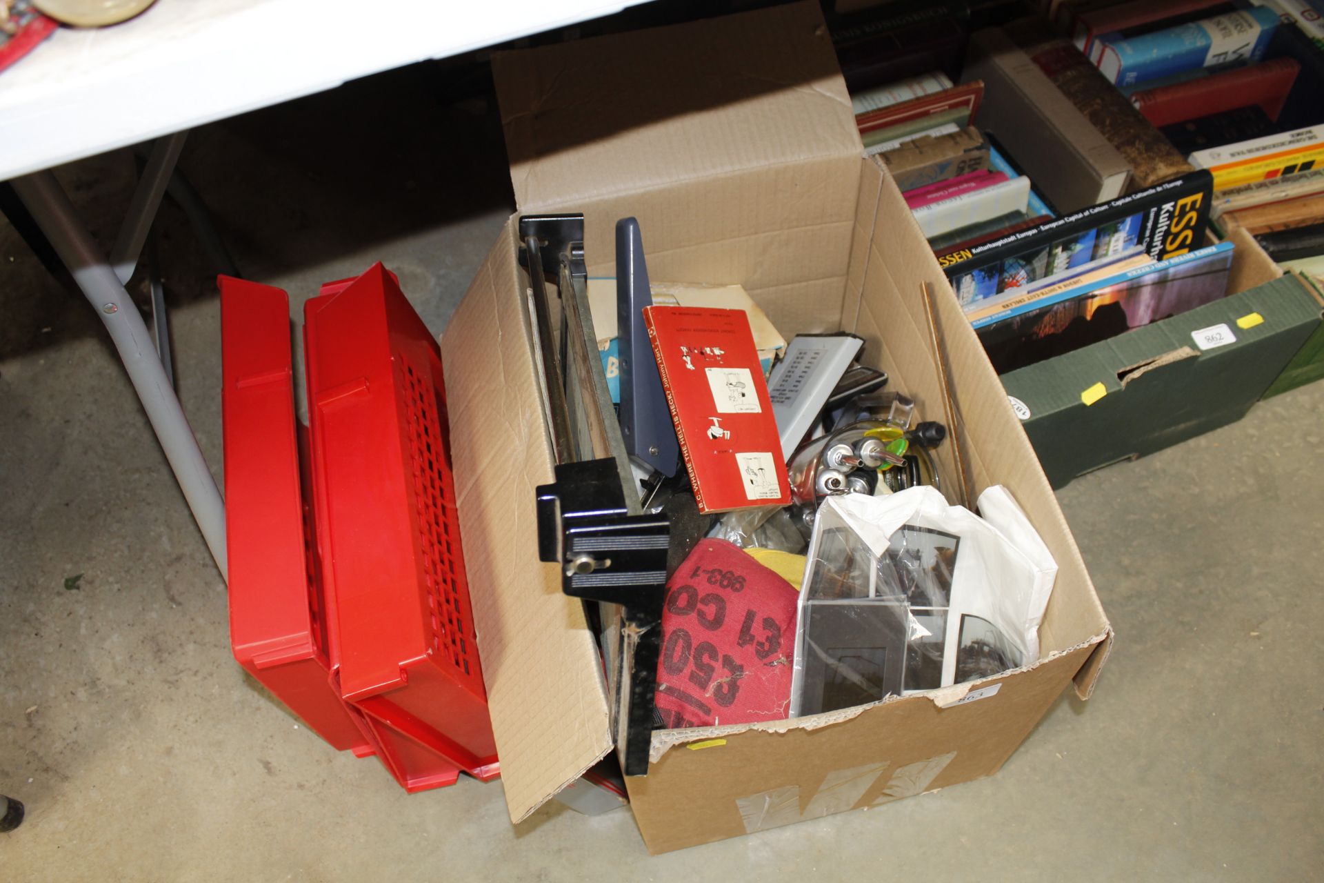 A box of various sundry items to include guillotin