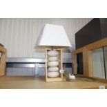 A modern design wooden and pottery table lamp with
