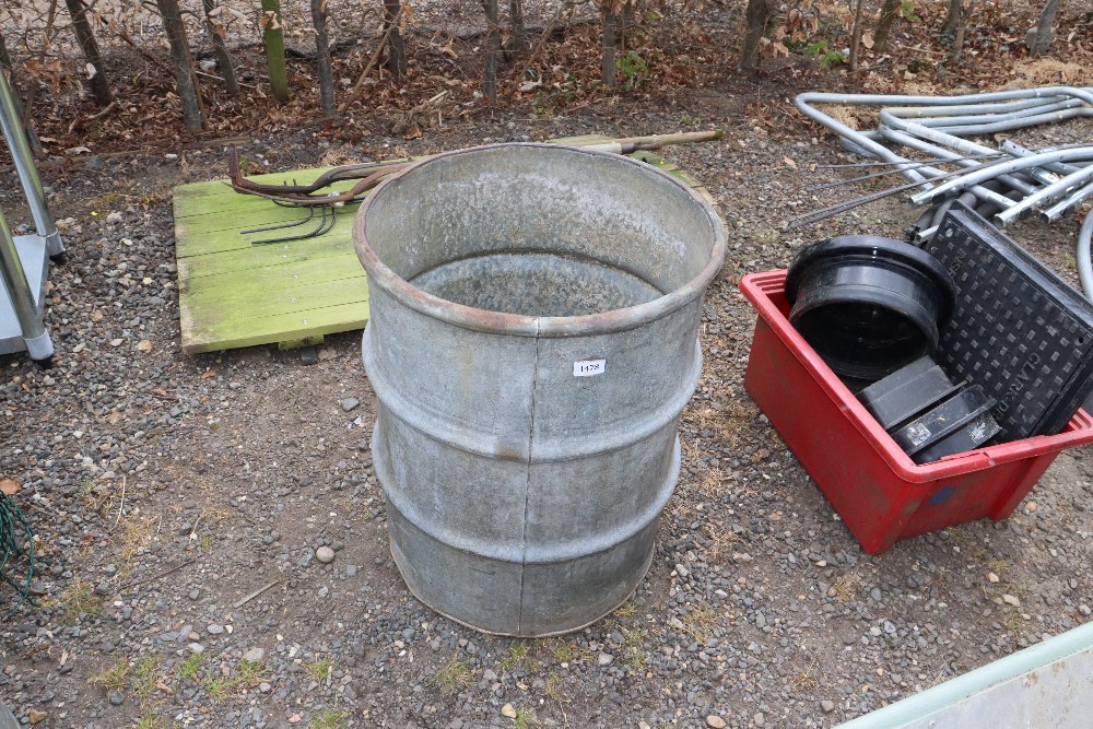 A galvanised round water tank