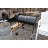 A garden barbeque with temperature gauge