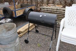 A garden barbeque with temperature gauge