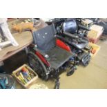 An i-Go Outlander self propelled folding wheelchai