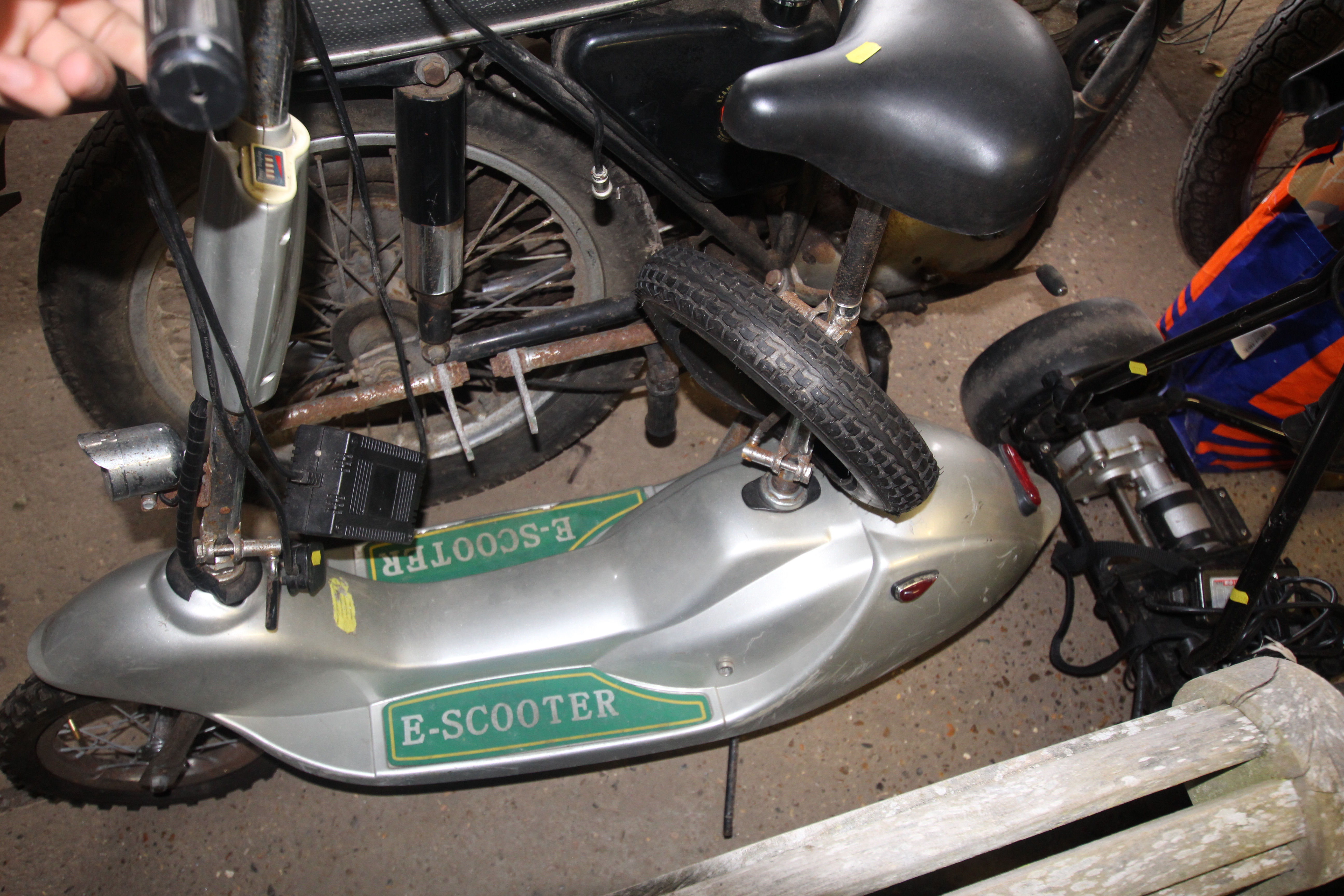 An E-Scooter with charger, spare wheel and key, so - Image 4 of 4