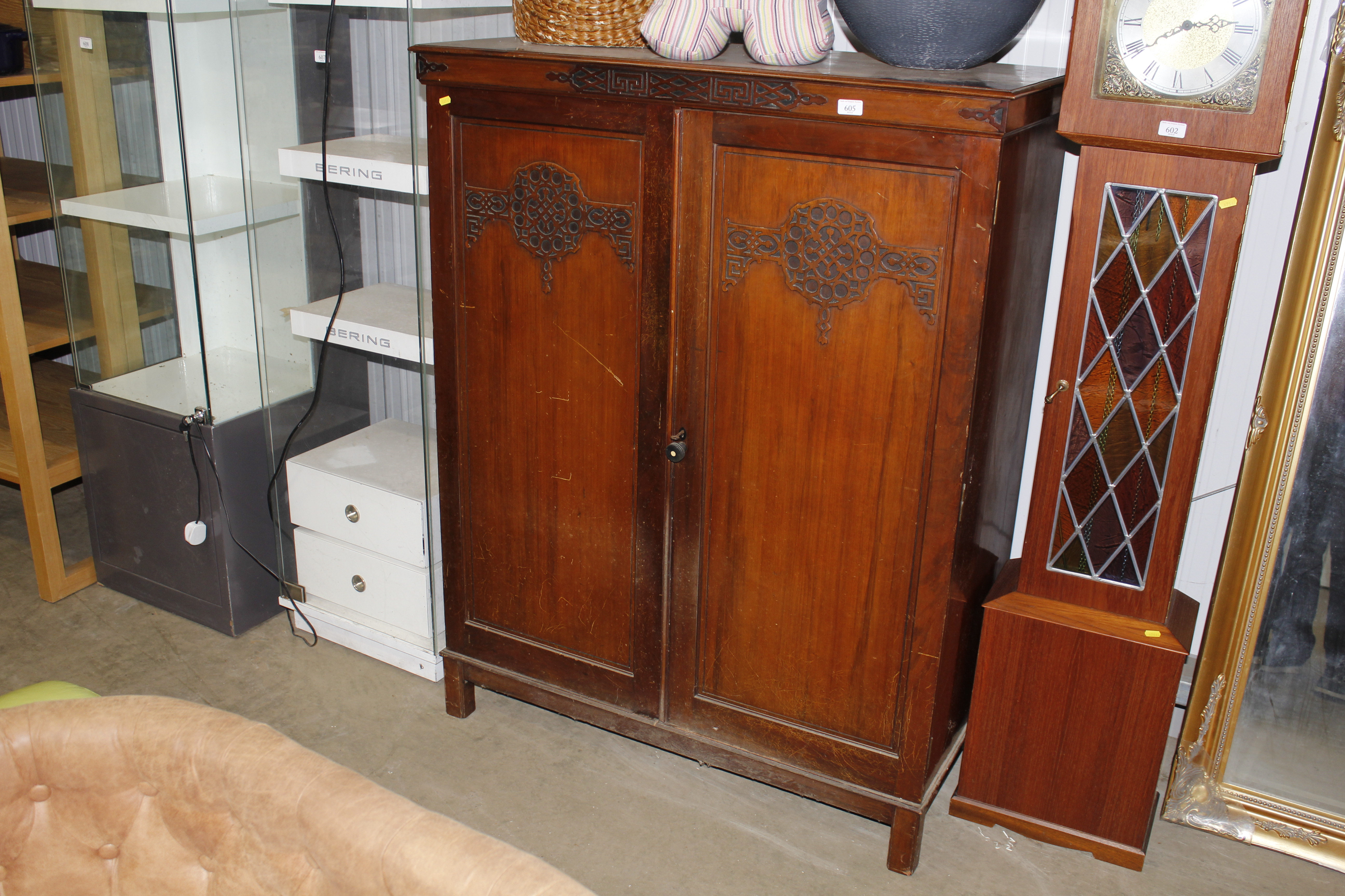 A mahogany gents wardrobe