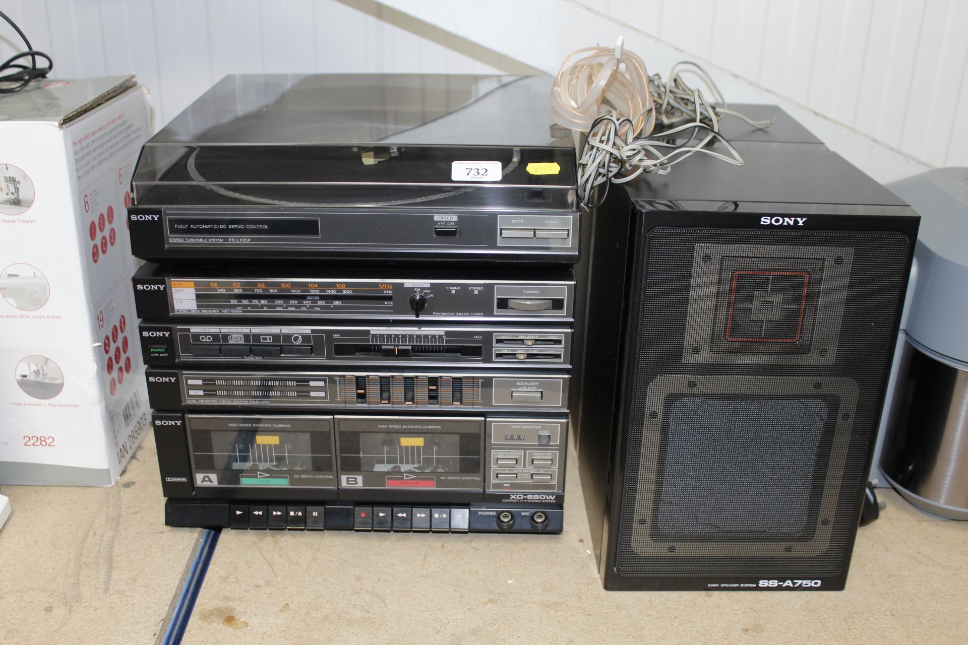 A Sony HiFi together with a pair of speakers
