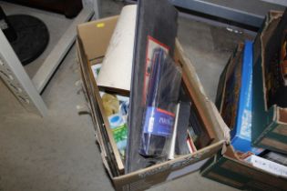 A box containing various sundry items including ph