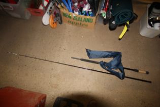 A two piece Abu Garcia Conolon uptide fishing rod