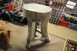 A rustic wooden three legged stool (measuring appr