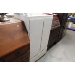 A white painted cupboard fitted single drawer