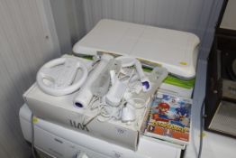 A Wii Fit Board, various games and accessories