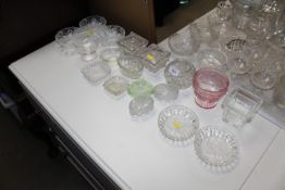 A collection of various glassware to include bowls