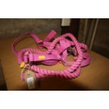 A pink rope pony halter (size COB)