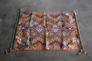 An approx. 4'1" x 2'9" Chobi Kilim rug