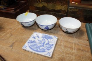 A pair of Chinese blue and white bowls and one oth