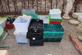 A quantity of plastic storage crates/boxes
