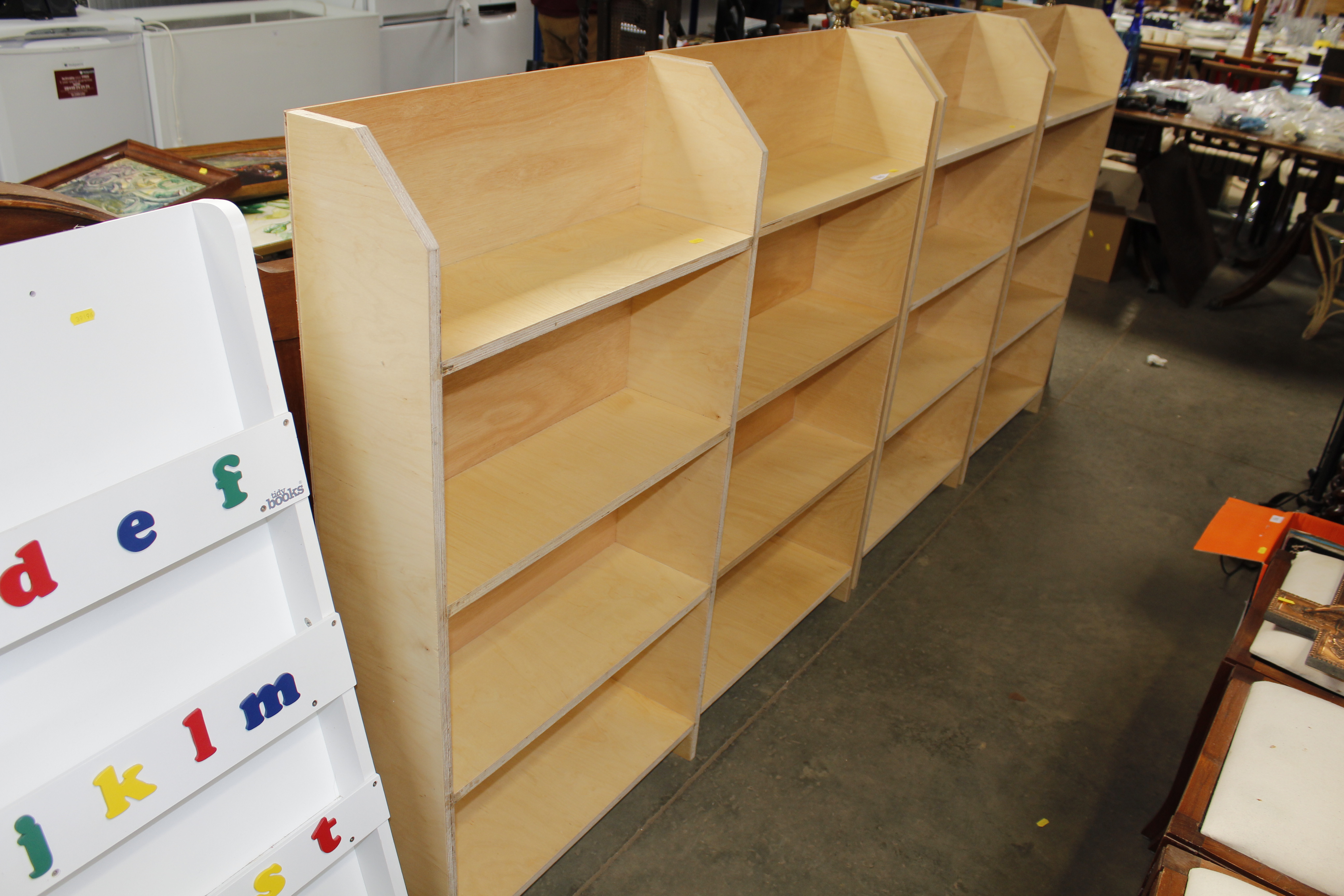 Two plywood bookcases