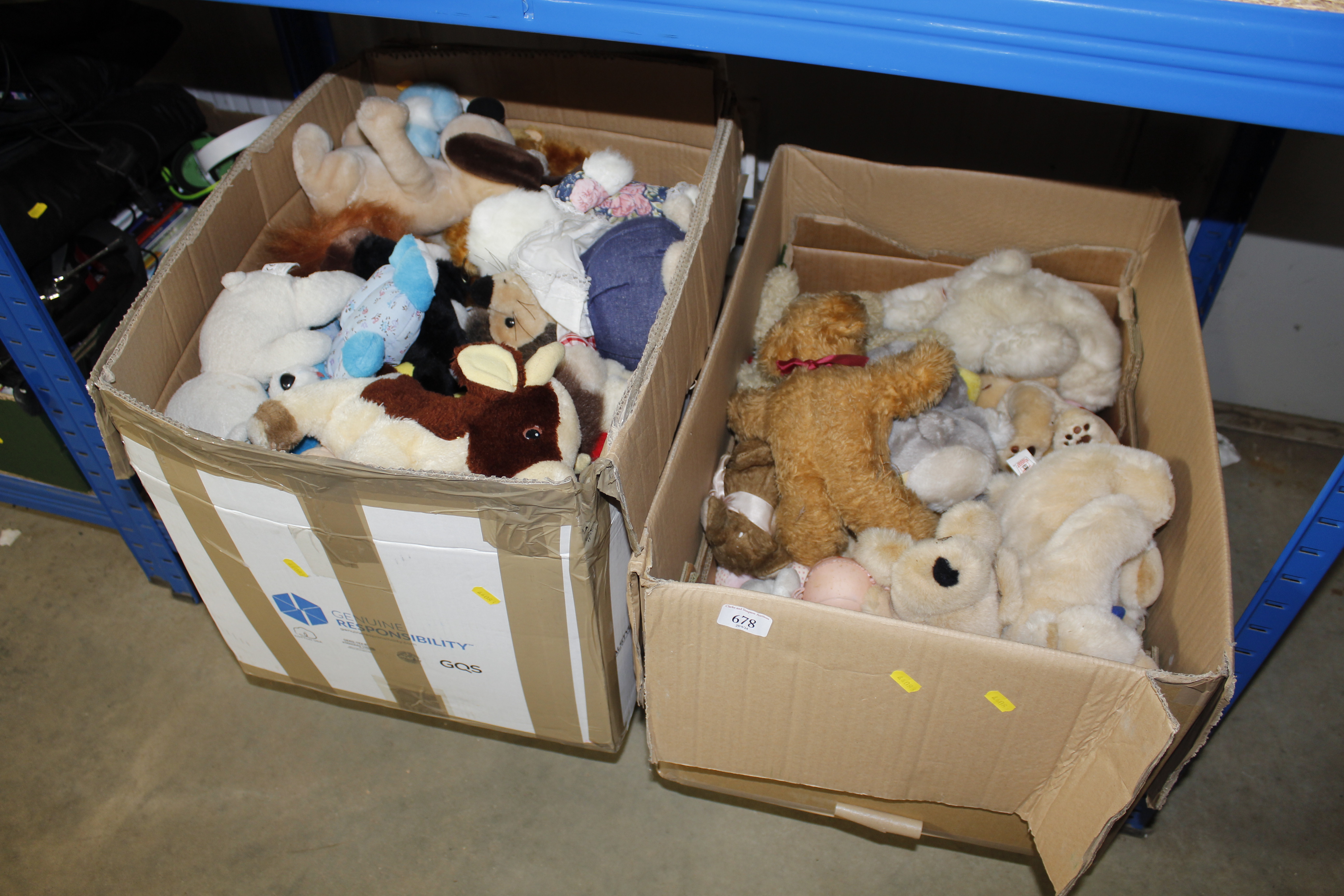 Two boxes containing various stuffed toys