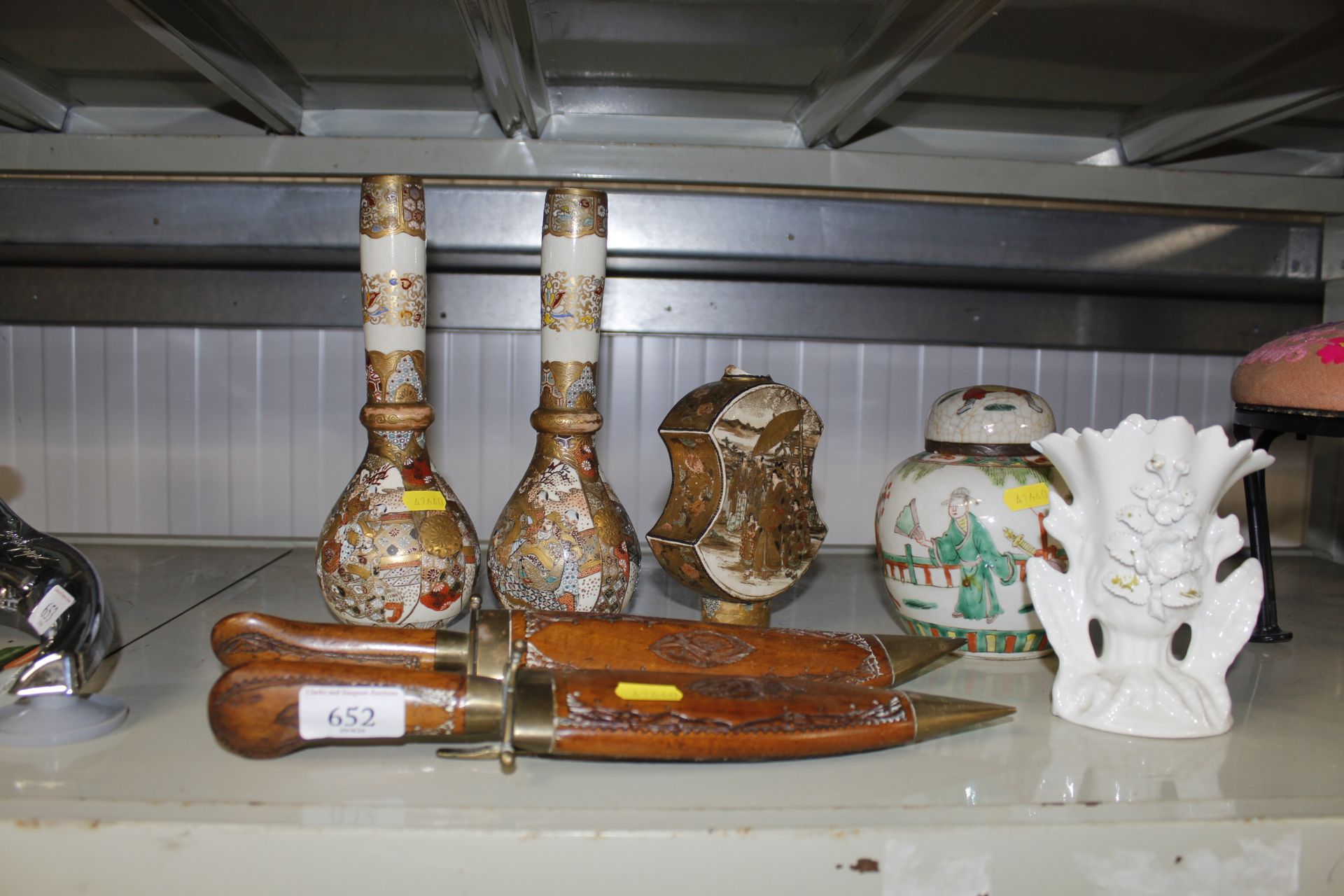 A pair of satsuma vases and a single satsuma vase