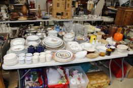 A large quantity of various patterned dinner ware