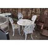 A white painted aluminium ornate table and set of